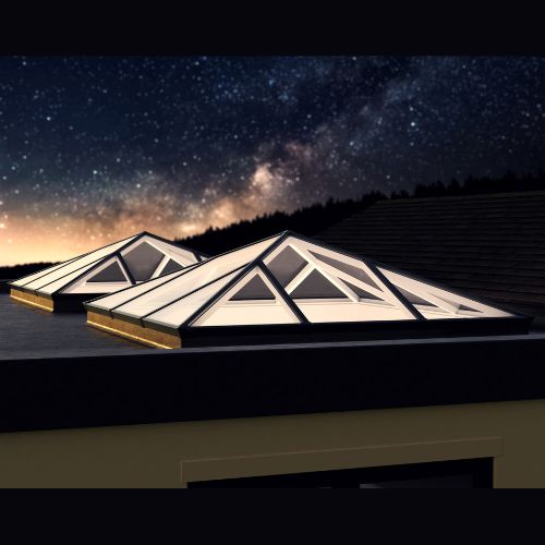 Two roof lantern skylights on a roof with a starry night sky background